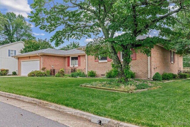 3304 N Marion Ave, Hopewell, VA 23860 - single story home featuring a garage, brick siding, and a front yard