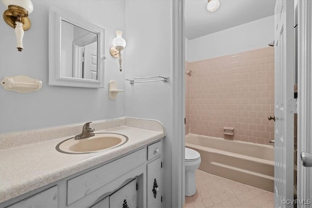 3304 N Marion Ave, Hopewell, VA 23860 - bathroom featuring tile patterned floors, toilet, vanity, and washtub / shower combination