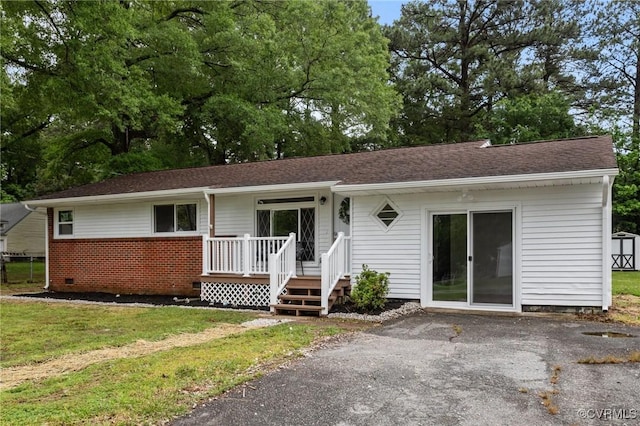 1505 Enon Church Rd, Chester, VA 23836 - single story home with a front yard, brick siding, and a shingled roof