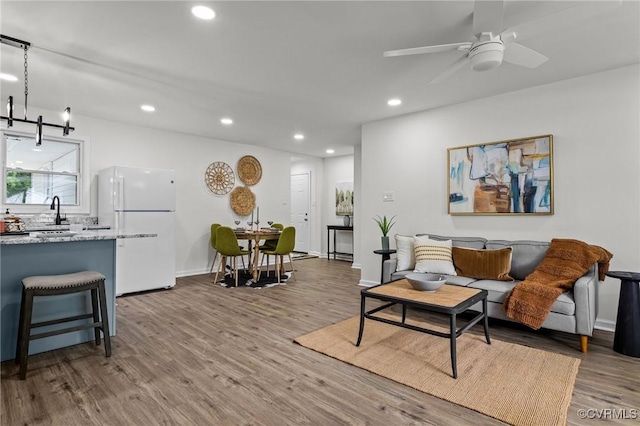 1505 Enon Church Rd, Chester, VA 23836 - living room featuring recessed lighting, wood finished floors, ceiling fan, baseboards, and a chandelier
