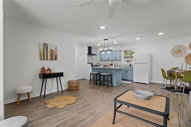 1505 Enon Church Rd, Chester, VA 23836 - living room with a chandelier, a ceiling fan, light wood-type flooring, recessed lighting, and baseboards