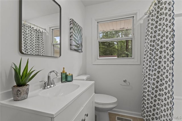 1505 Enon Church Rd, Chester, VA 23836 - full bathroom with healthy amount of natural light, toilet, vanity, and a shower with shower curtain