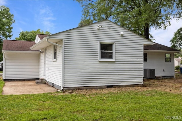 1505 Enon Church Rd, Chester, VA 23836 - view of home's exterior with a lawn, cooling unit, and a patio area