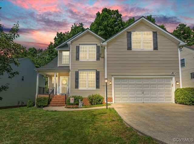 2013 Rose Family Dr, Midlothian, VA 23112 - traditional-style house with concrete driveway, an attached garage, a yard, and a porch
