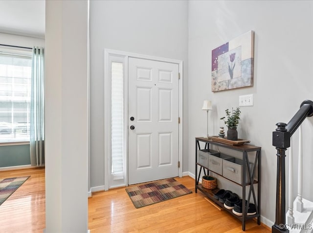 2013 Rose Family Dr, Midlothian, VA 23112 - entryway with light wood-type flooring, healthy amount of natural light, and baseboards