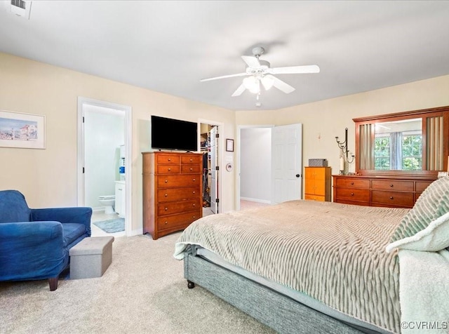 2013 Rose Family Dr, Midlothian, VA 23112 - bedroom featuring light carpet, connected bathroom, a spacious closet, a ceiling fan, and a closet