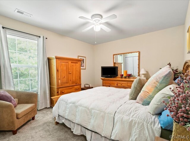 2013 Rose Family Dr, Midlothian, VA 23112 - bedroom with light colored carpet and ceiling fan