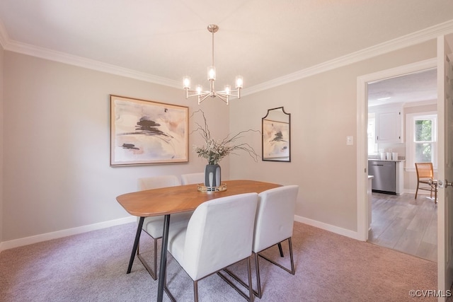 8282 Briarthorn Ct, Mechanicsville, VA 23116 - dining area featuring ornamental molding, a chandelier, baseboards, and light colored carpet