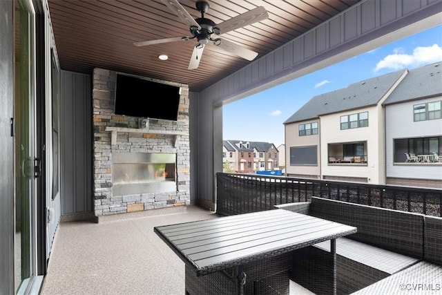 1906 Chartermark Dr, Midlothian, VA 23114 - view of patio with an outdoor stone fireplace, a ceiling fan, and a residential view