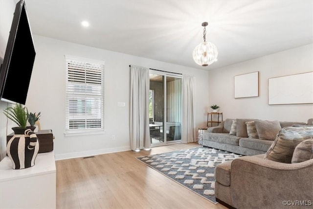 1906 Chartermark Dr, Midlothian, VA 23114 - living area featuring light wood-style floors, a chandelier, baseboards, and recessed lighting