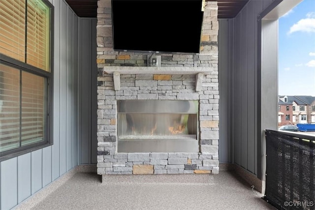 1906 Chartermark Dr, Midlothian, VA 23114 - detailed view of a fireplace, board and batten siding, and stone siding