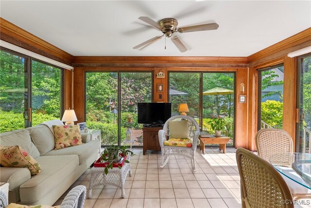 7290 Hill View Dr, Mechanicsville, VA 23111 - sunroom / solarium featuring a ceiling fan, outdoor lounge area, tile patterned floors, healthy amount of natural light, and wood walls