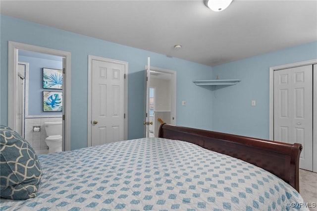 bedroom featuring ensuite bath
