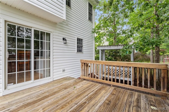 deck featuring a pergola