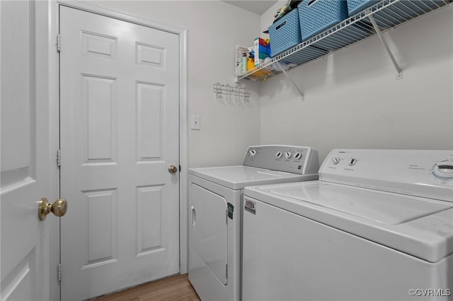 11441 Alder Glen Way, Glen Allen, VA 23059 - laundry room with washer and clothes dryer and light wood-type flooring