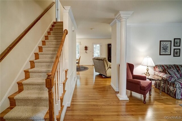 4329 Stebbins St, Chester, VA 23831 - stairs featuring ornate columns, wood finished floors, crown molding, and baseboards