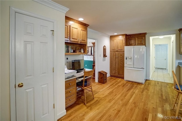 4329 Stebbins St, Chester, VA 23831 - kitchen featuring white fridge with ice dispenser, light wood-style floors, crown molding, baseboards, and brown cabinetry