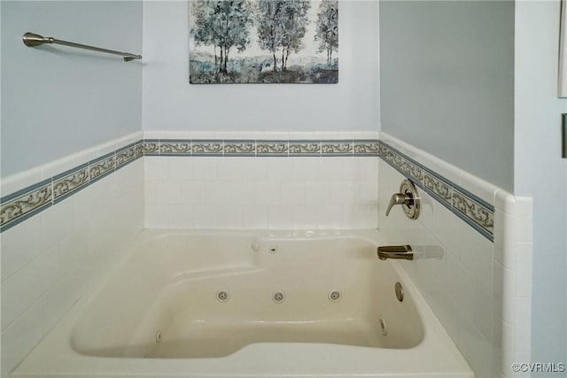 4329 Stebbins St, Chester, VA 23831 - bathroom with a jetted tub and a wainscoted wall