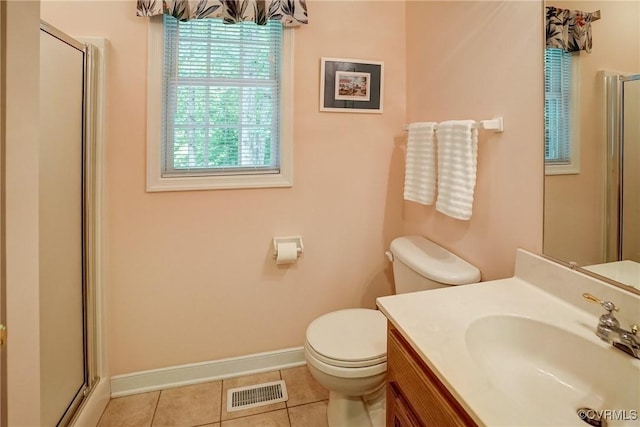 4329 Stebbins St, Chester, VA 23831 - full bathroom with a shower stall, tile patterned flooring, toilet, baseboards, and vanity