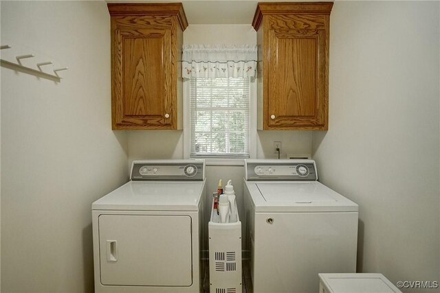 4329 Stebbins St, Chester, VA 23831 - clothes washing area featuring washing machine and dryer and cabinet space
