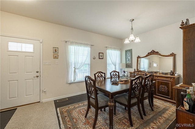 8421 Eden St, Henrico, VA 23228 - dining room featuring baseboards and a chandelier