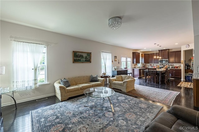 8421 Eden St, Henrico, VA 23228 - living room with baseboards, dark wood finished floors, and recessed lighting