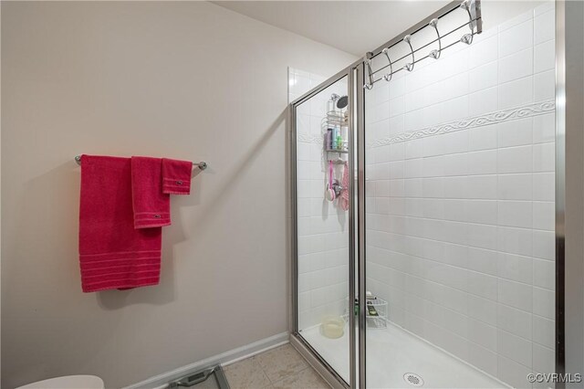 8421 Eden St, Henrico, VA 23228 - full bath with a shower stall, baseboards, toilet, and tile patterned flooring