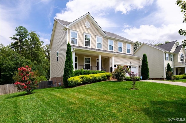 8421 Eden St, Henrico, VA 23228 - view of front of home featuring an attached garage, concrete driveway, and covered porch