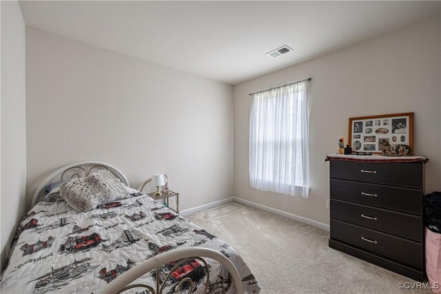 8421 Eden St, Henrico, VA 23228 - bedroom with light carpet and baseboards