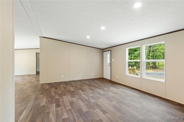 15011 Elm Cottage Rd, Amelia Courthouse, VA 23002 - spare room featuring wood finished floors, a textured ceiling, and recessed lighting