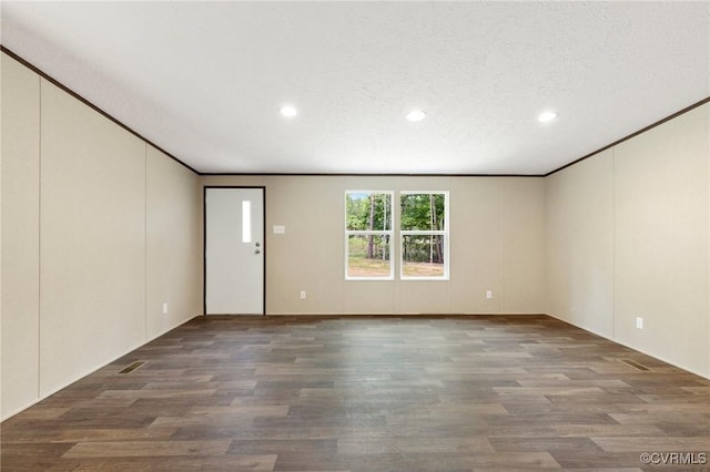 15011 Elm Cottage Rd, Amelia Courthouse, VA 23002 - unfurnished room featuring a decorative wall, recessed lighting, wood finished floors, and crown molding