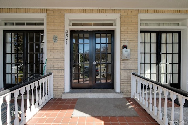 601 Roseneath Rd Unit U11, Richmond, VA 23221 - doorway to property with french doors, brick siding, and a porch
