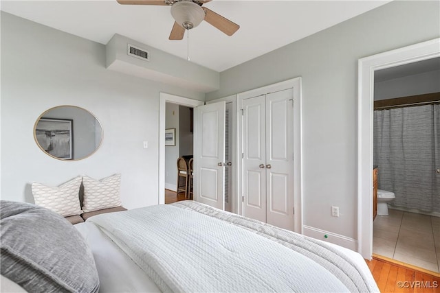 601 Roseneath Rd Unit U11, Richmond, VA 23221 - bedroom featuring baseboards, light wood finished floors, ceiling fan, and ensuite bathroom