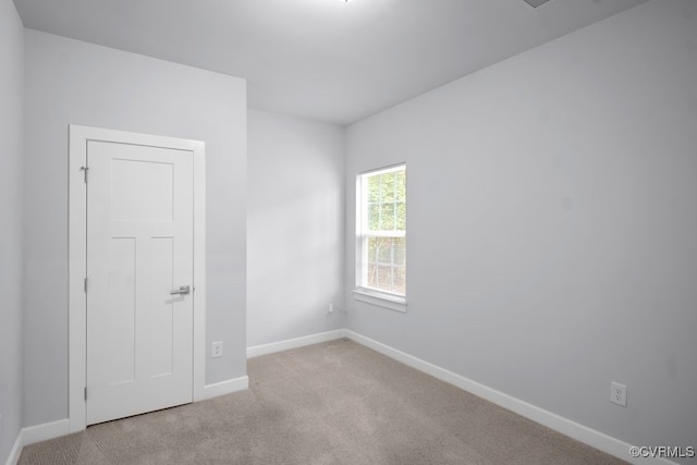 8136 Fedora Dr, Chesterfield, VA 23838 - unfurnished room with baseboards and light carpet