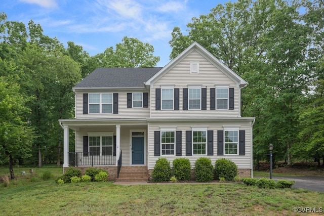 8136 Fedora Dr, Chesterfield, VA 23838 - view of front of house with covered porch and a front yard