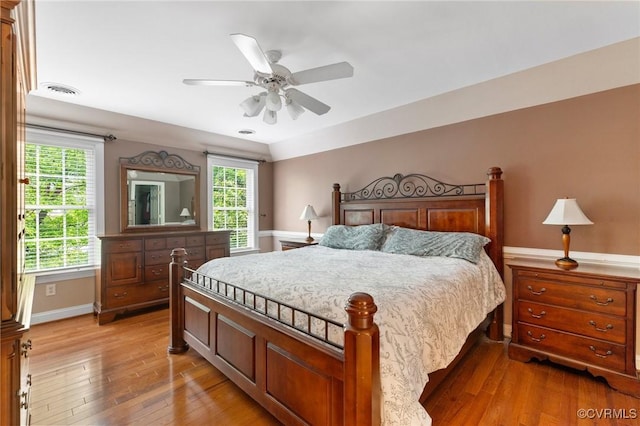 8413 Chandon Ct, Chesterfield, VA 23838 - bedroom featuring light wood-style floors, baseboards, multiple windows, and ceiling fan