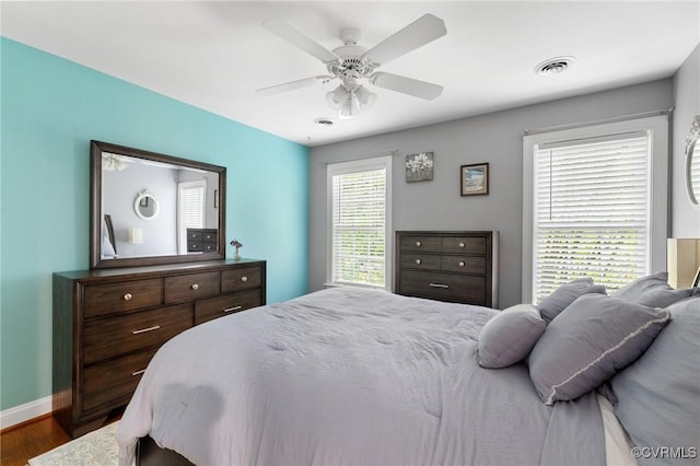 8413 Chandon Ct, Chesterfield, VA 23838 - bedroom with dark wood-style flooring, baseboards, and ceiling fan