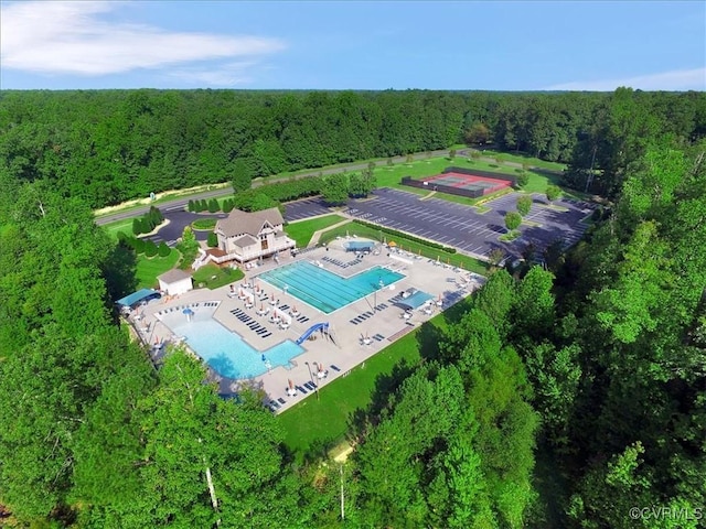 8413 Chandon Ct, Chesterfield, VA 23838 - aerial view of a heavily wooded area and a pool area