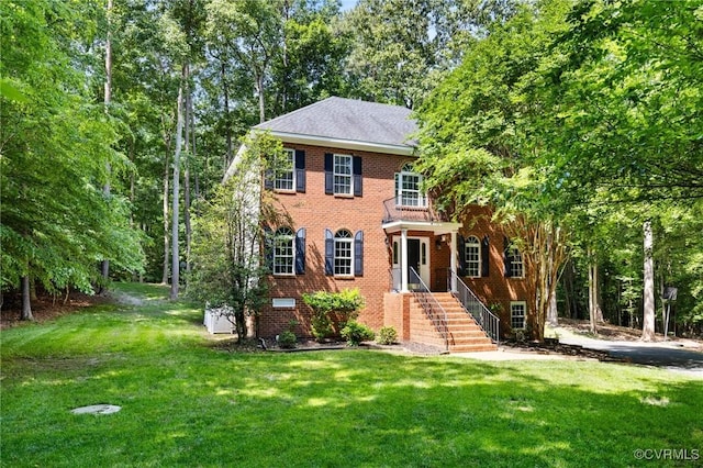 8413 Chandon Ct, Chesterfield, VA 23838 - colonial home with a front yard and brick siding