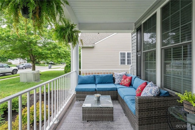 balcony with a porch and outdoor lounge area