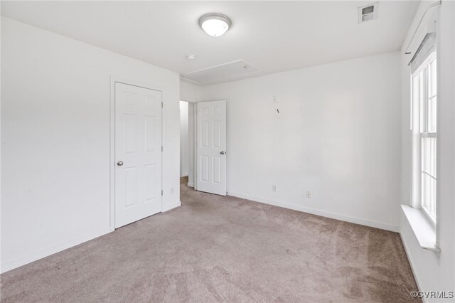 2909 Ginter St, Henrico, VA 23228 - unfurnished room featuring attic access, carpet, and plenty of natural light