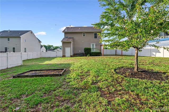 2909 Ginter St, Henrico, VA 23228 - rear view of property featuring a garden