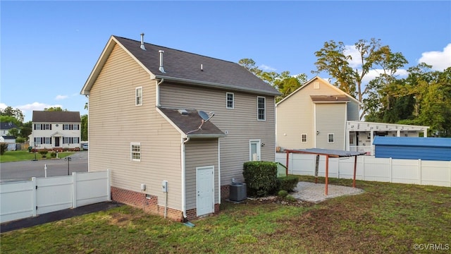 2909 Ginter St, Henrico, VA 23228 - rear view of property with cooling unit and roof with shingles