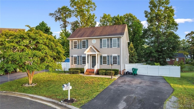 2909 Ginter St, Henrico, VA 23228 - colonial-style house featuring asphalt driveway