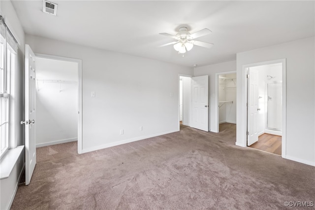 2909 Ginter St, Henrico, VA 23228 - unfurnished bedroom with a walk in closet, a closet, carpet, baseboards, and ensuite bathroom