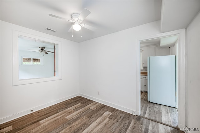 27 Medlock Rd, Sandston, VA 23150 - empty room featuring ceiling fan, wood finished floors, and baseboards