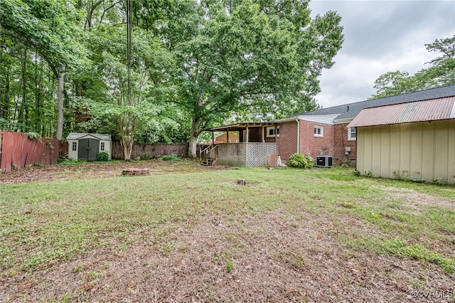 27 Medlock Rd, Sandston, VA 23150 - view of yard with a storage unit and an outbuilding