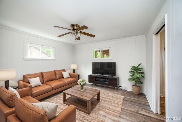 27 Medlock Rd, Sandston, VA 23150 - living room with wood finished floors, ornamental molding, plenty of natural light, and ceiling fan