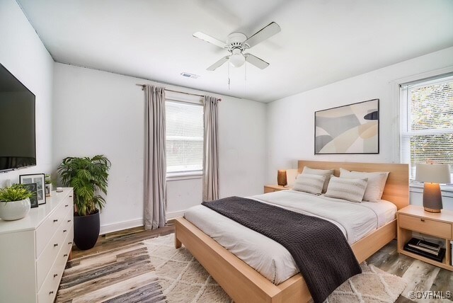 27 Medlock Rd, Sandston, VA 23150 - bedroom with light wood-style floors, baseboards, and a ceiling fan