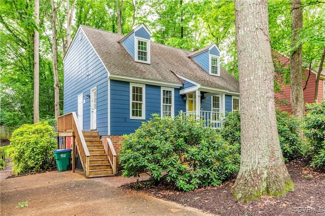 5905 Willow Creek Way, Richmond, VA 23225 - cape cod house with a shingled roof and view of wooded area